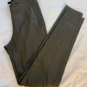 Olive green faux leather leggings with zip side